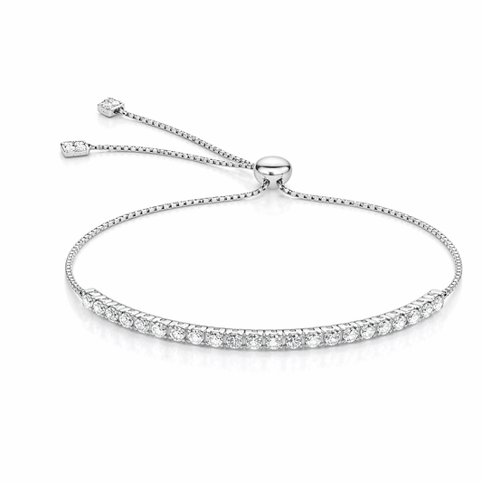 Elegant silver adjustable bracelet with sparkling stones.