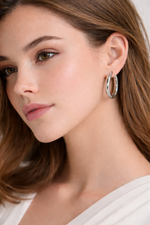 Polished Silver Oval Hoop Earrings. (Medium)