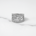 Sleek multi-band diamond ring with twin halo sparkle.
