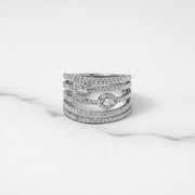 Sleek multi-band diamond ring with twin halo sparkle.