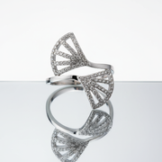 Elegant silver ring with a unique twin fan design,