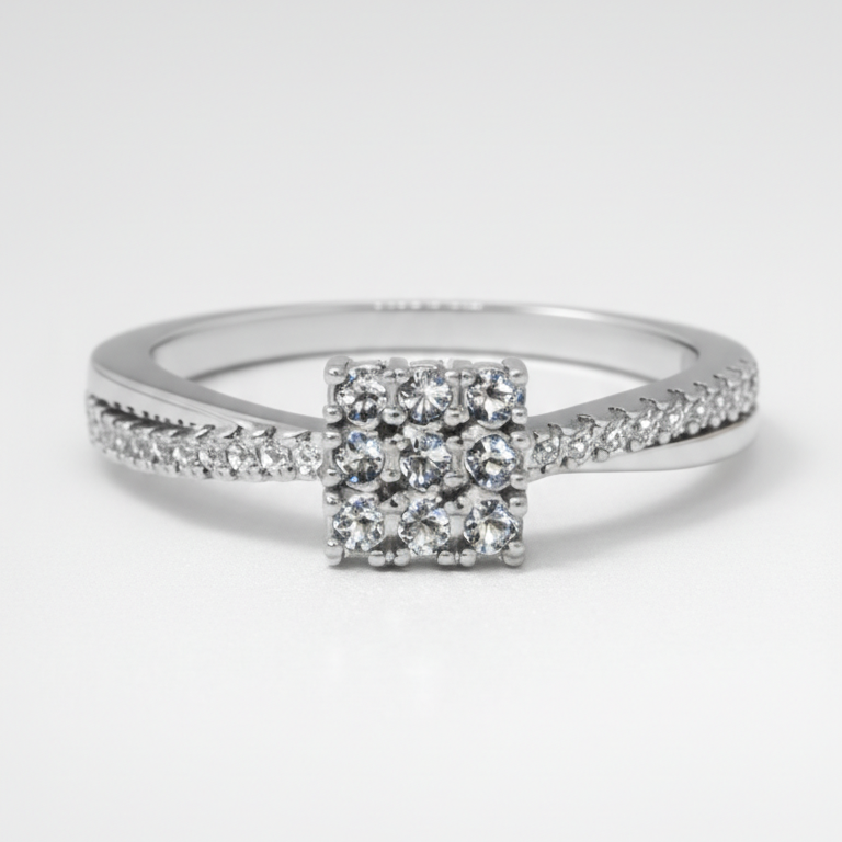 Elegant square cluster diamond ring with a delicate sparkling band.
