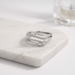 Elegant white gold multi-band ring with sparkling pavé diamonds and delicate pear-cut accents