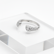Elegant open-end silver ring with dual sparkling stones.